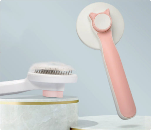 Self-cleaning cat brush with one-click fur release