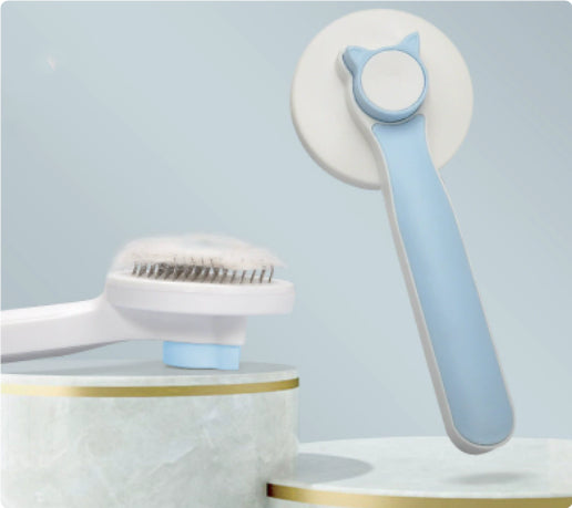 Self-cleaning cat brush with one-click fur release